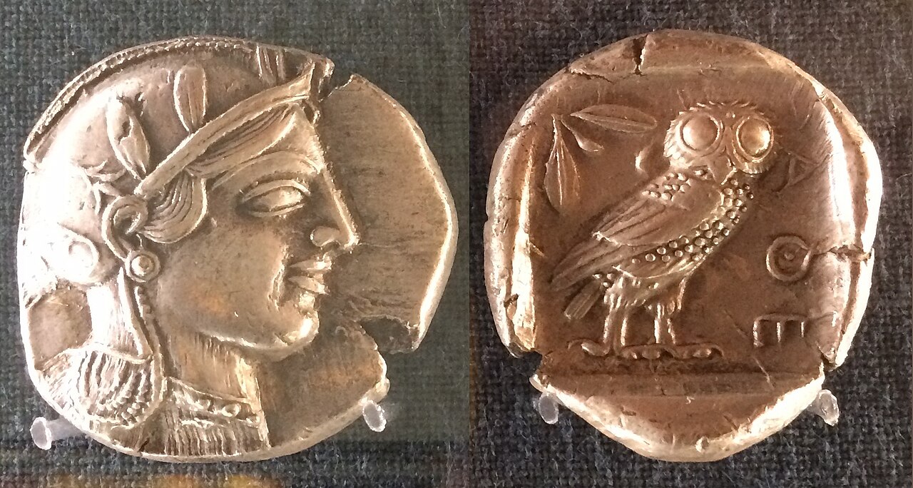 Reverse of an Athenian silver tetradrachm coin showing the Little Owl (Athene noctua).