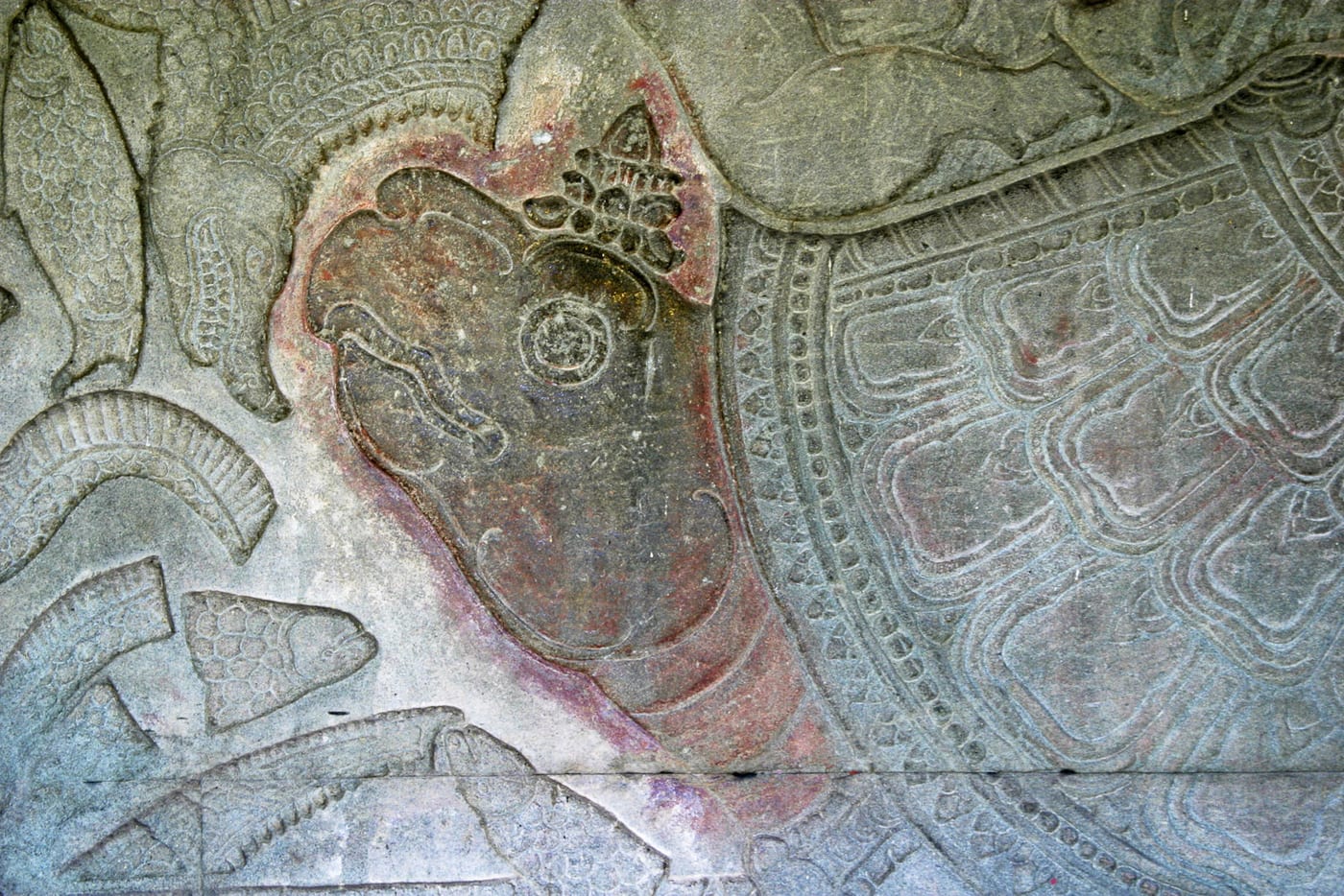 Angkor Wat bas-relief showing Kurma, the tortoise avatar of Vishnu, supporting Mount Mandara during the churning of the cosmic ocean of milk.