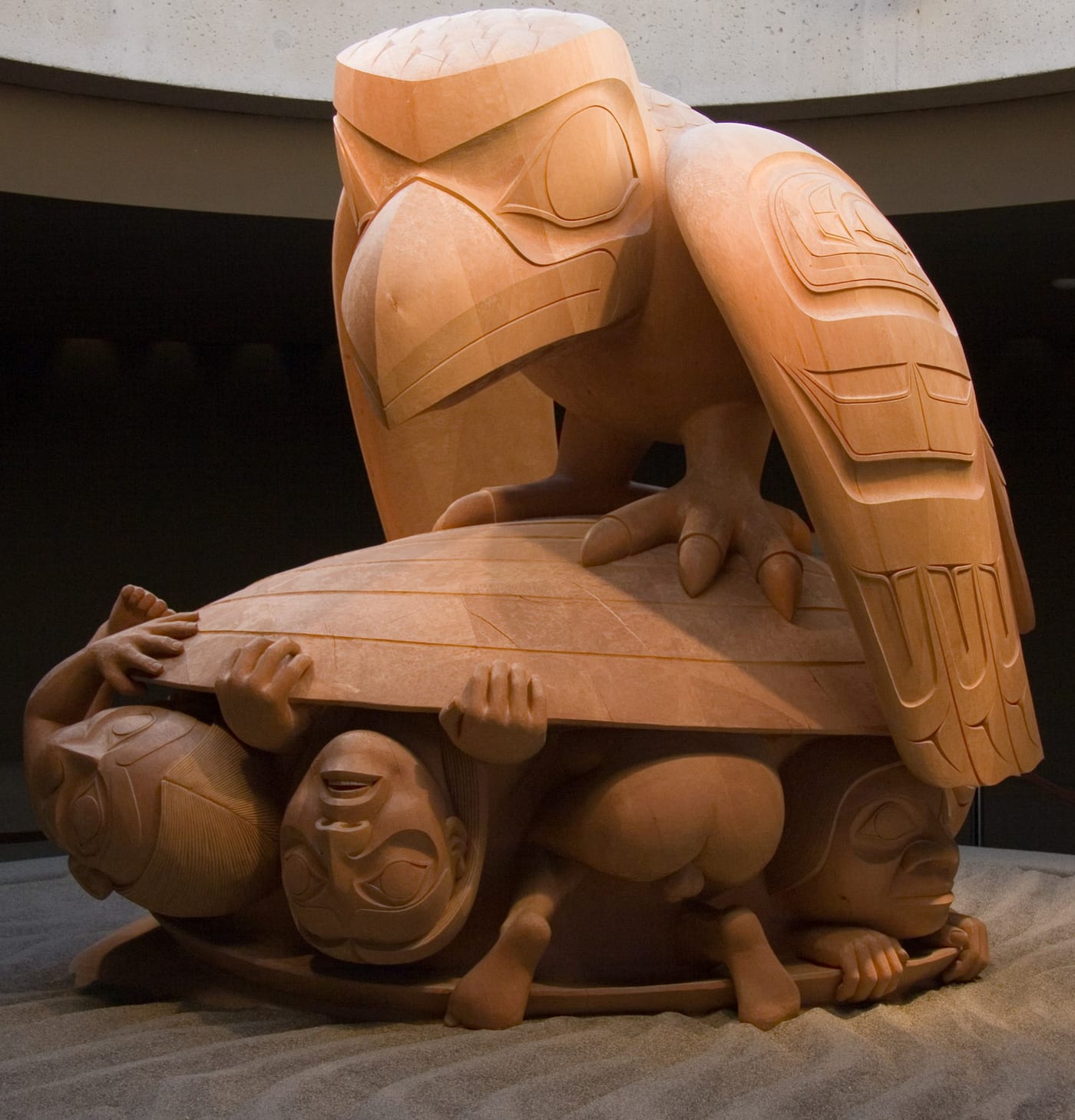 The Raven and the First Men, cedar sculpture by Bill Reid (1980), showing the Haida creation moment, with orca and other marine creatures in the base relief, Museum of Anthropology, University of British Columbia.