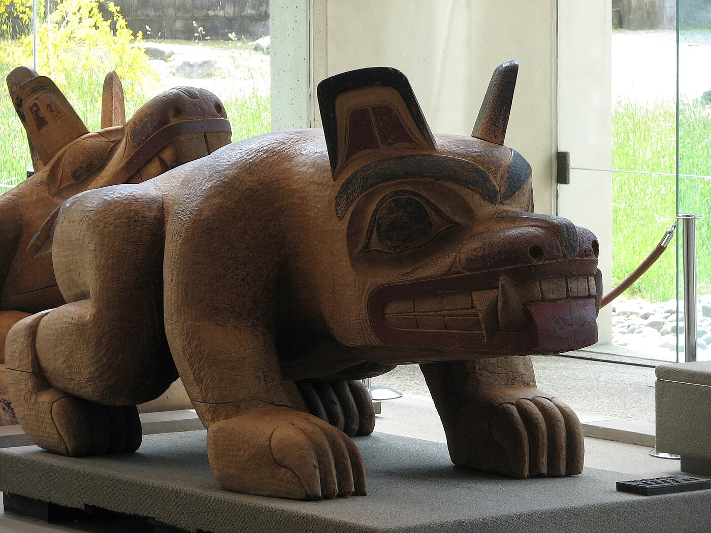 Bill Reid's Haida Bear carving at the Museum of Anthropology, University of British Columbia, demonstrating Northwest Coast formline art as a system of Indigenous identity encoding.