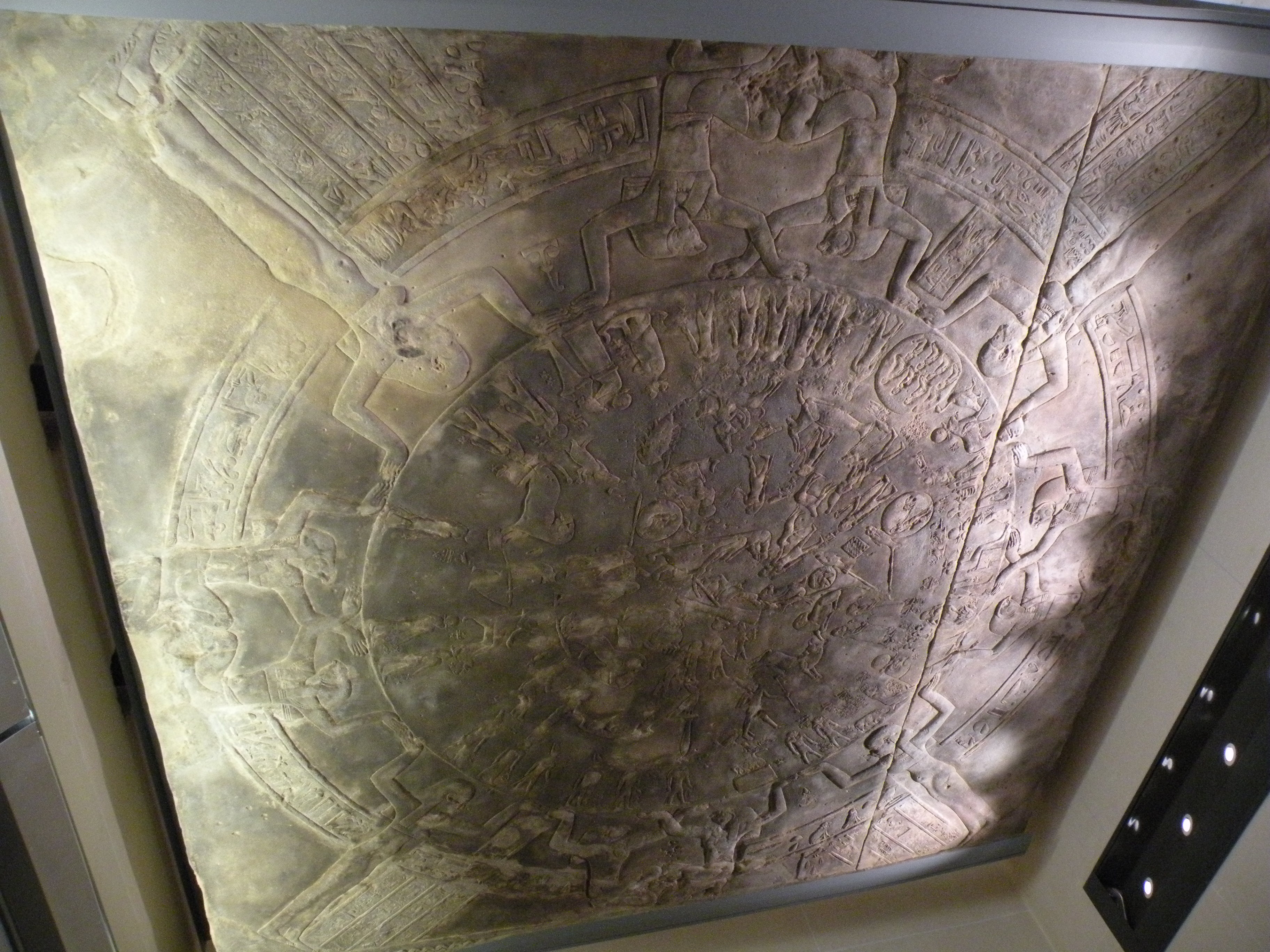 Dendera Zodiac sandstone bas-relief, c. 50 BCE, with the ram of Aries among the twelve zodiacal figures arranged around the Egyptian decans.